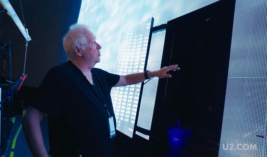 ’Now we go behind the screen…’