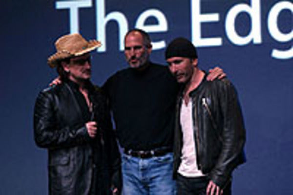With Steve Jobs of Apple