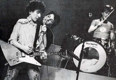 Bono and The Edge playing live