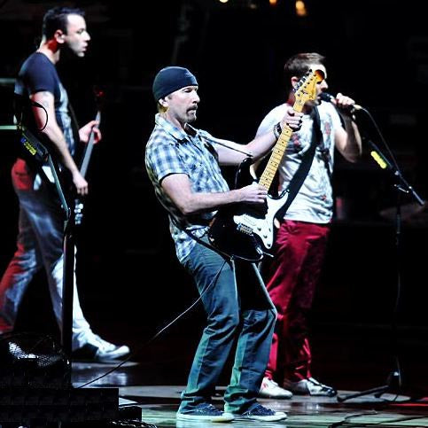 The Edge joins Muse at Glastonbury 2010. Photo by Shan Lui