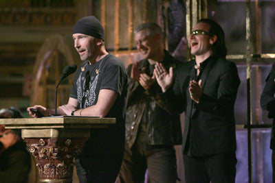 The Edge accepting the award