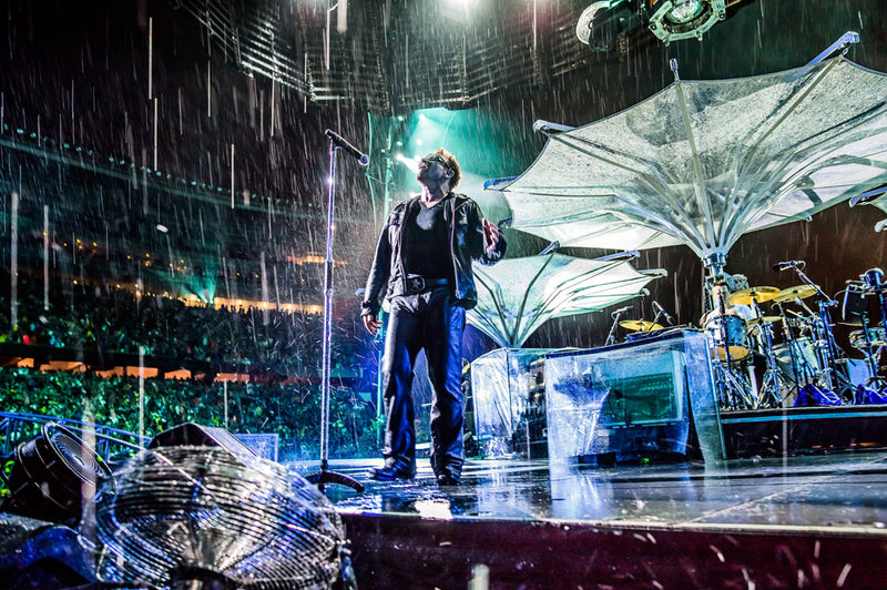 Bono singing in the rain - From The Ground Up: U2.Com Music Edition