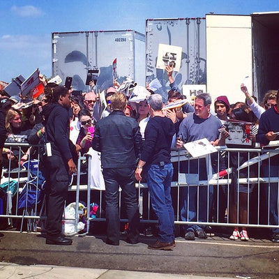 Signing autographs at The Forum